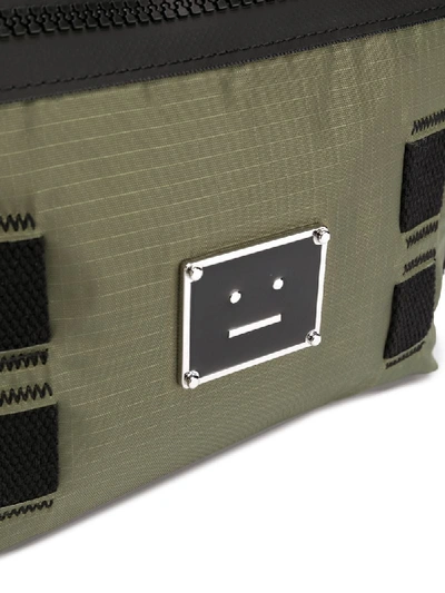 Shop Acne Studios Logo Plaque Crossbody Bag In Green