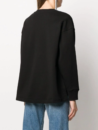 Shop Moschino Cotton Logo Print Sweater In Black