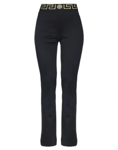 Shop Versace Casual Pants In Black