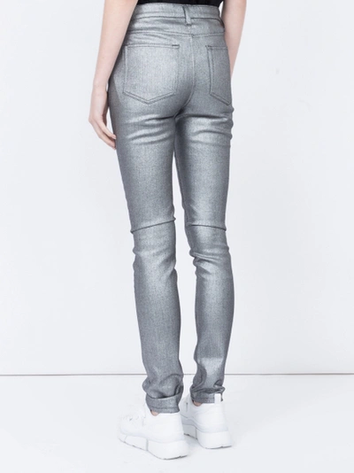 Shop Saint Laurent Metallic Skinny Jeans