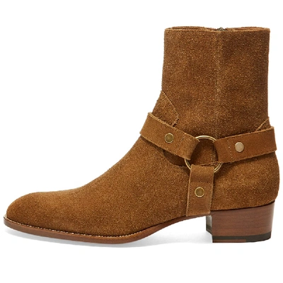 Shop Saint Laurent Wyatt Harness Suede Boot In Brown