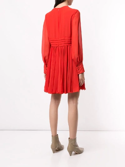 Shop Karen Walker Scarlet Chiffon Skating Dress In Orange