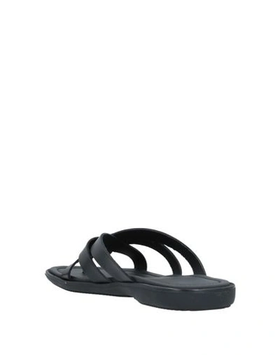 Shop Doucal's Flip Flops In Black