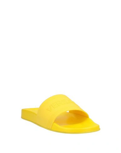 Shop Versace Sandals In Yellow