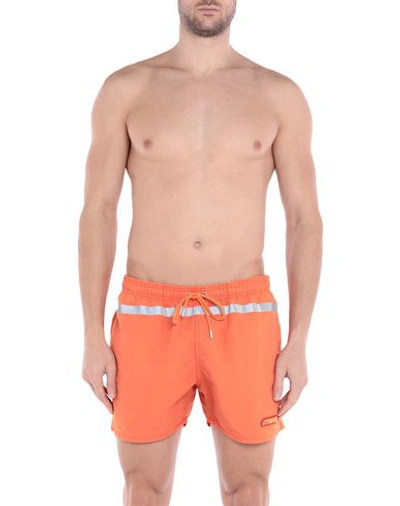 Shop Heron Preston Swim Trunks In Orange