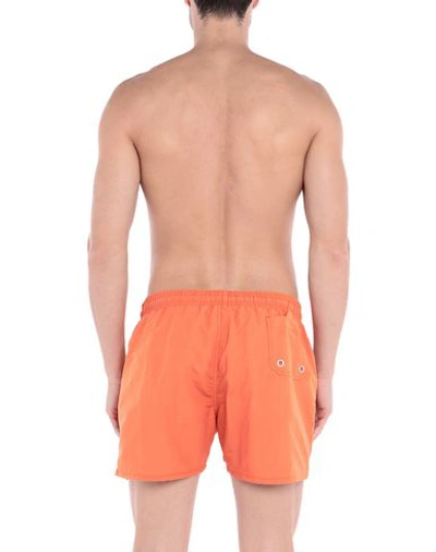 Shop Heron Preston Swim Trunks In Orange