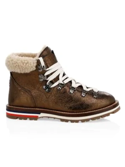 Shop Moncler Blanche Shearling-trimmed Metallic Leather Hiking Boots In Metallic Copper
