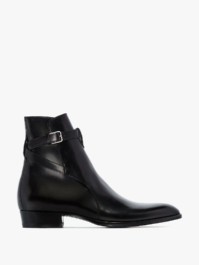 Shop Saint Laurent Strap Detail Leather Boots In Black
