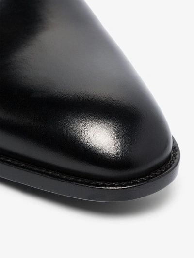 Shop Saint Laurent Strap Detail Leather Boots In Black