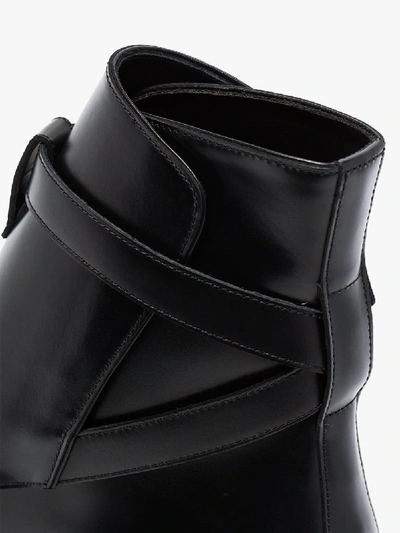 Shop Saint Laurent Strap Detail Leather Boots In Black