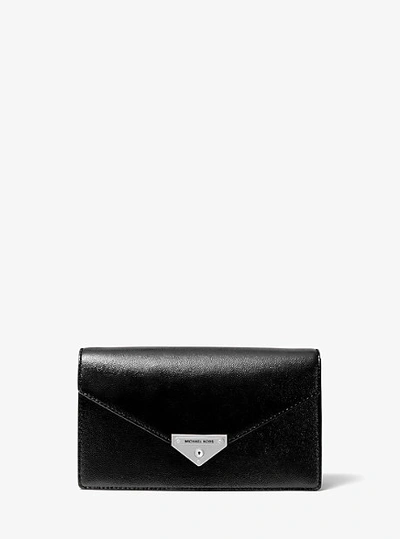 Shop Michael Kors Grace Medium Patent Leather Envelope Clutch In Black