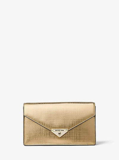 Shop Michael Kors Grace Medium Metallic Leather Envelope Clutch In Gold