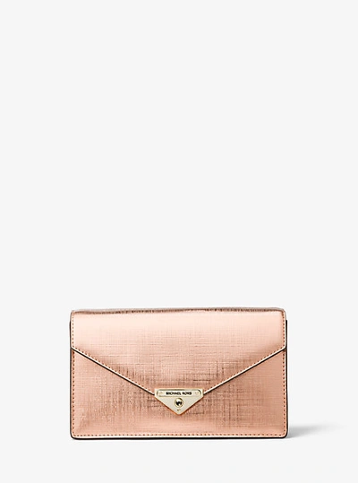Shop Michael Kors Grace Medium Metallic Leather Envelope Clutch In Pink