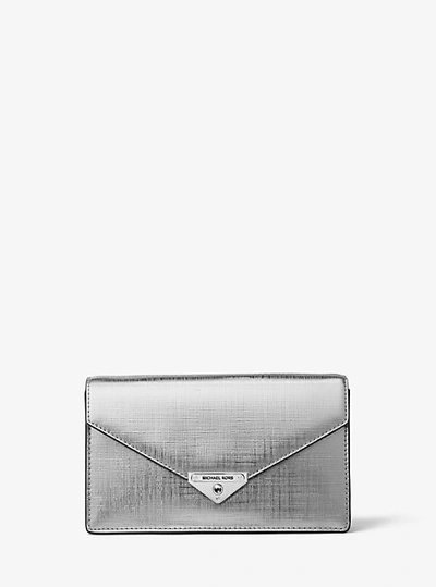 Shop Michael Kors Grace Medium Metallic Leather Envelope Clutch In Silver