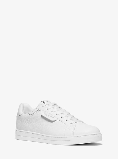 Shop Michael Kors Keating Pebbled Leather Sneaker In White