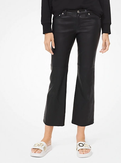 Shop Michael Kors Izzy Leather Cropped Flared Pants In Black