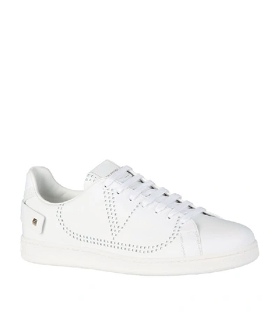 Shop Valentino Garavani Leather Backnet Logo Sneakers