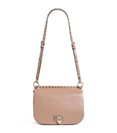 Shop Valentino Leather Rockstud Saddle Bag