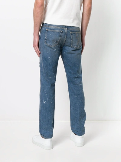Shop Givenchy Distressed Ripped Knee Jeans