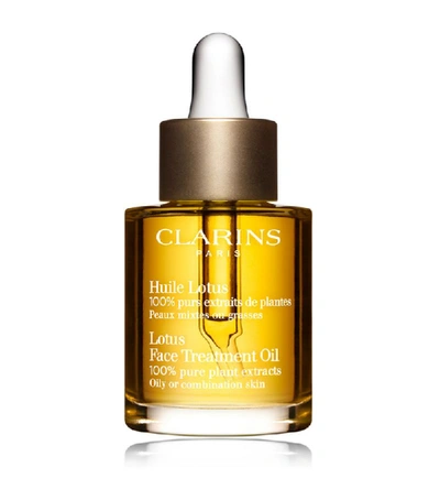 Shop Clarins Lotus Face Treatment Oil (30ml) In Multi