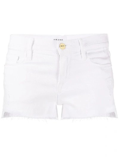 Shop Frame Frayed Denim Cut Off Shorts In White