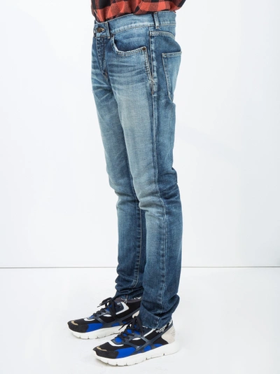 Shop Saint Laurent Midblue Skinny Distressed Jeans