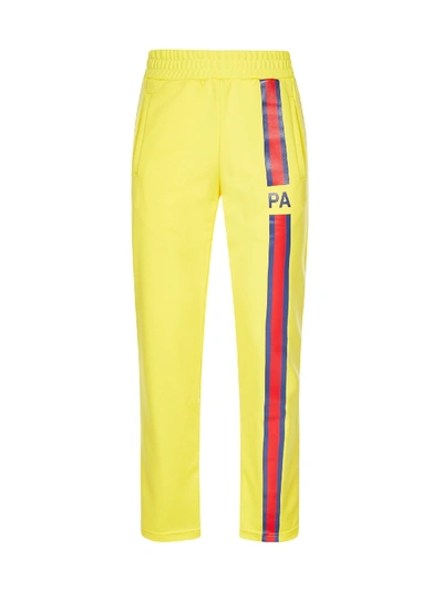 Shop Palm Angels Trousers In Giallo