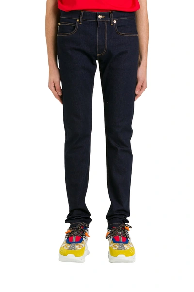Shop Versace Slim Fit Jeans In Blu