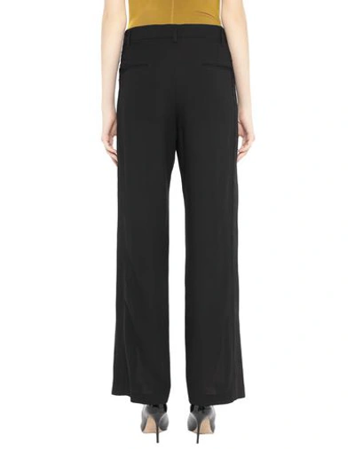 Ann Demeulemeester Maaike Pressed-crease Flared Trousers In Black