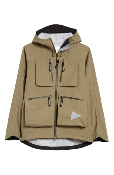 And Wander Event Dropping Pocket Rain Jacket In Khaki | ModeSens