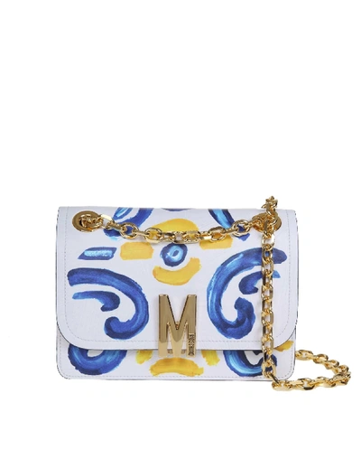 Shop Moschino Maiolica Print Crossbody Bag In White/bluette