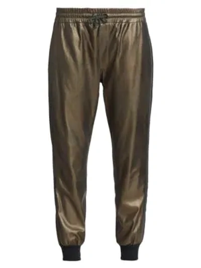 Shop Brunello Cucinelli Metallic Leather Joggers In Bronze