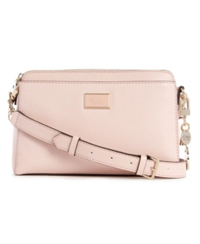 Shop Guess Pish Posh Girlfriend Crossbody In Blush/gold