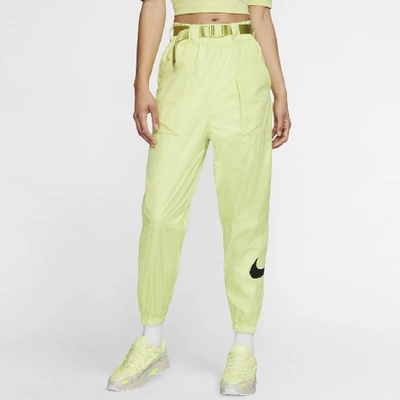 Shop Nike Sportswear Womens Woven Swoosh Pants In Green