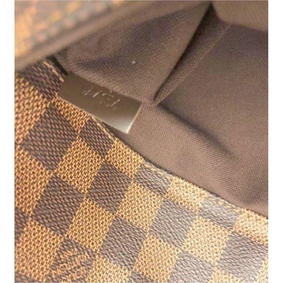 District cloth bag Louis Vuitton Brown in Cloth - 27476842