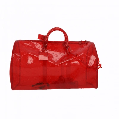 Pre-owned Louis Vuitton Red Plastic Bags