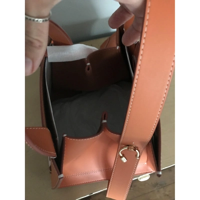 Pre-owned Danse Lente Orange Leather Handbag