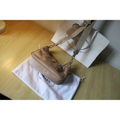 Pre-owned Prada Re-edition Beige Cloth Handbag