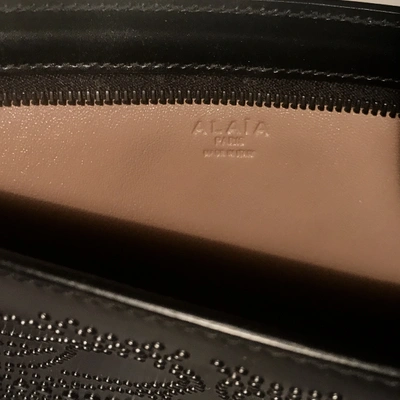 Pre-owned Alaïa Leather Clutch Bag In Black