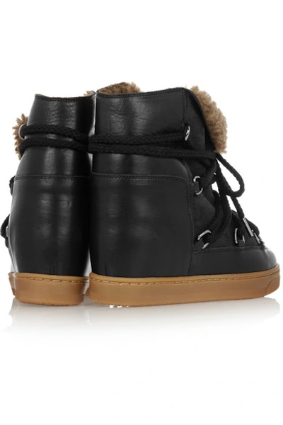 Shop Isabel Marant Nowles Shearling-lined Leather Concealed Wedge Boots In Black