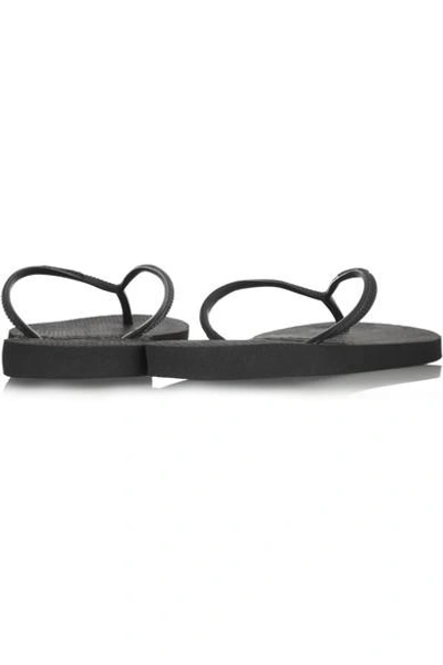 Shop Havaianas Slim Rubber Flip Flops In Black