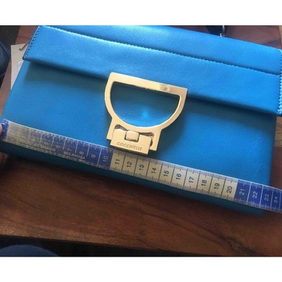 Pre-owned Coccinelle Leather Clutch Bag In Turquoise