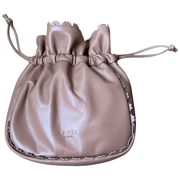pink leather clutch bag