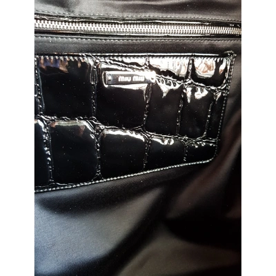 Pre-owned Miu Miu Patent Leather Backpack In Black