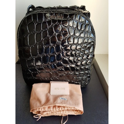 Pre-owned Miu Miu Patent Leather Backpack In Black