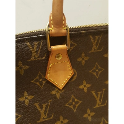 Pre-owned Louis Vuitton Brown Cloth Handbags