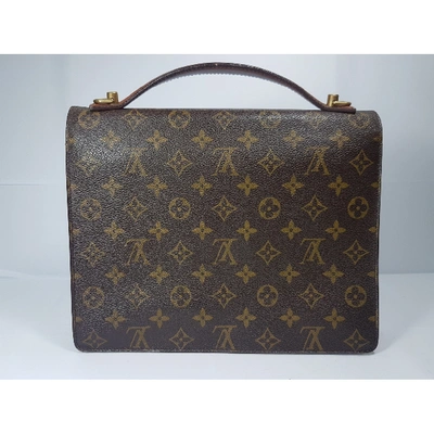 Pre-owned Louis Vuitton Concorde Cloth Handbag In Brown