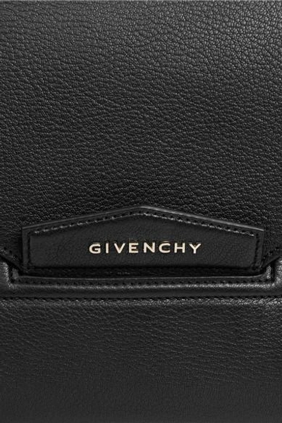 Shop Givenchy Antigona Textured-leather Clutch In Black