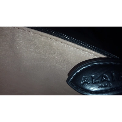 Pre-owned Alaïa Leather Clutch Bag In Black