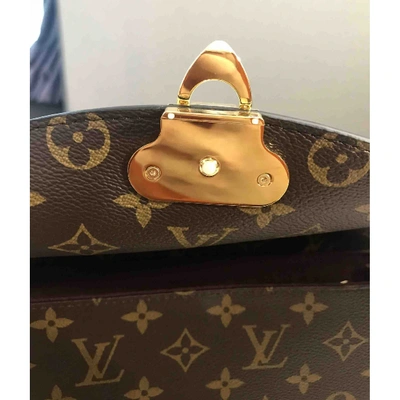 Saint placide cloth handbag Louis Vuitton Burgundy in Cloth - 26374695